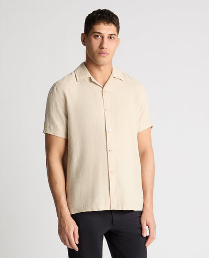 Man wearing a cream casual shirt