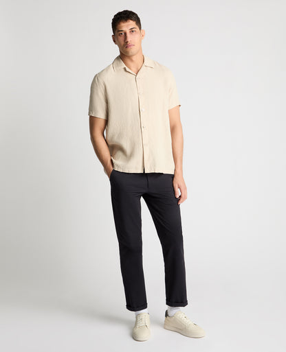 Man wearing a cream casual shirt