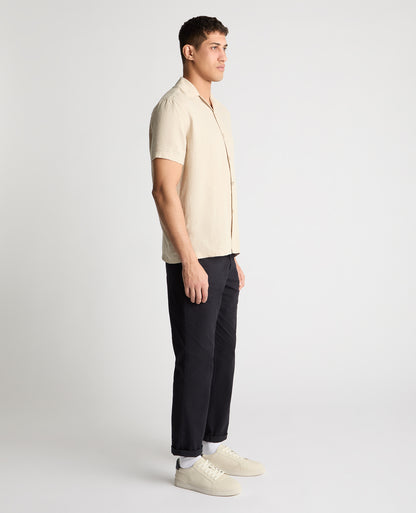 Man wearing a cream casual shirt