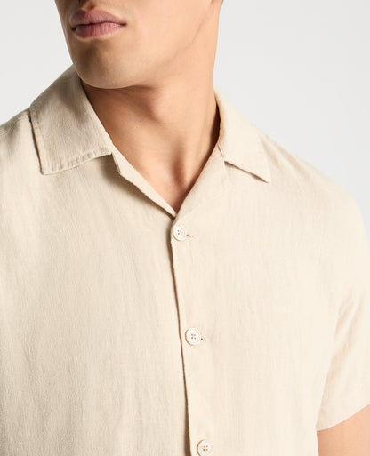 Man wearing a cream casual shirt