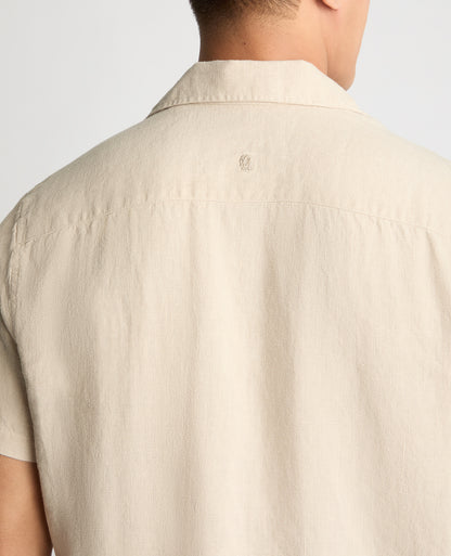 Man wearing a cream casual shirt