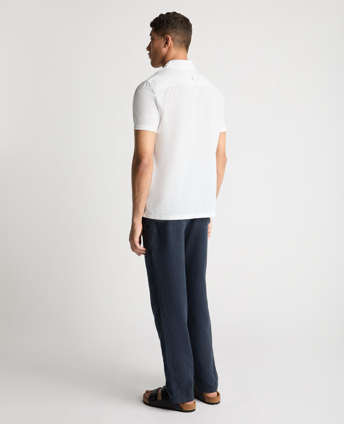 Man wearing a White casual shirt