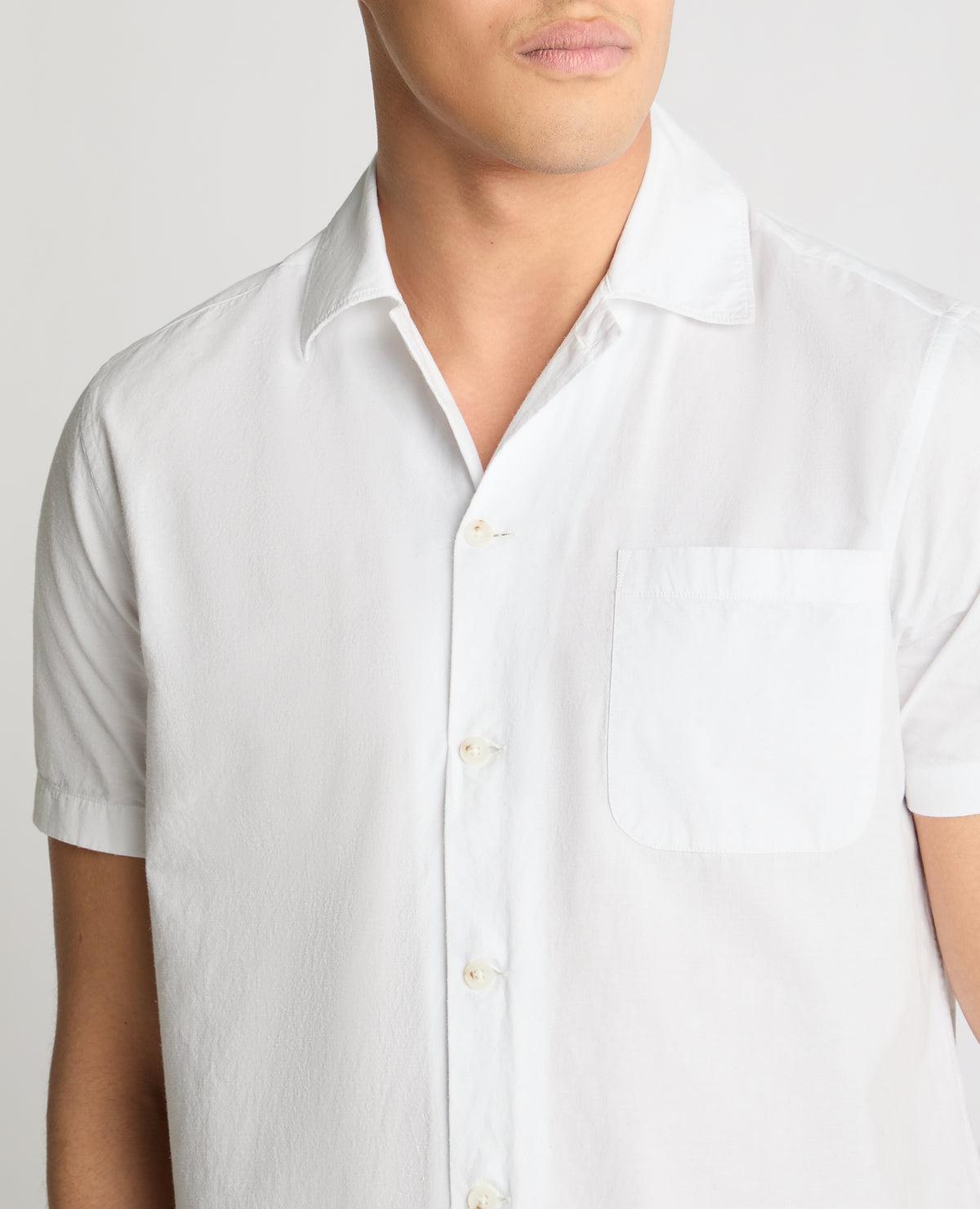 Man wearing a White casual shirt