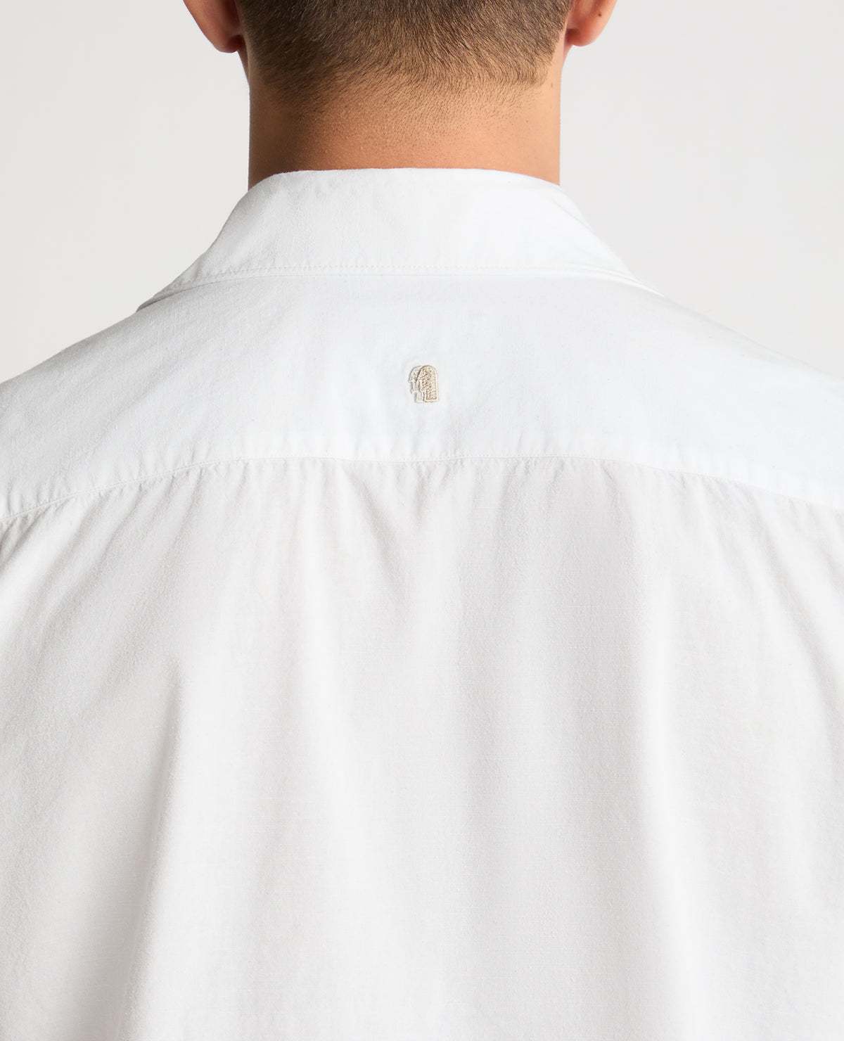 Man wearing a White casual shirt