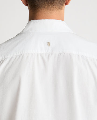 Man wearing a White casual shirt