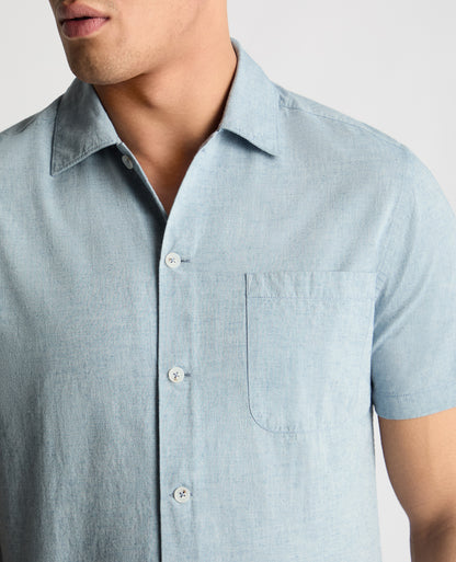 Man wearing a blue casual shirt