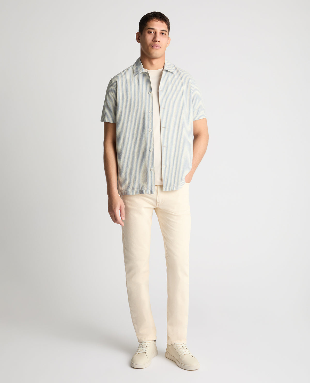 Man wearing a blue casual shirt