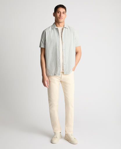 Man wearing a blue casual shirt