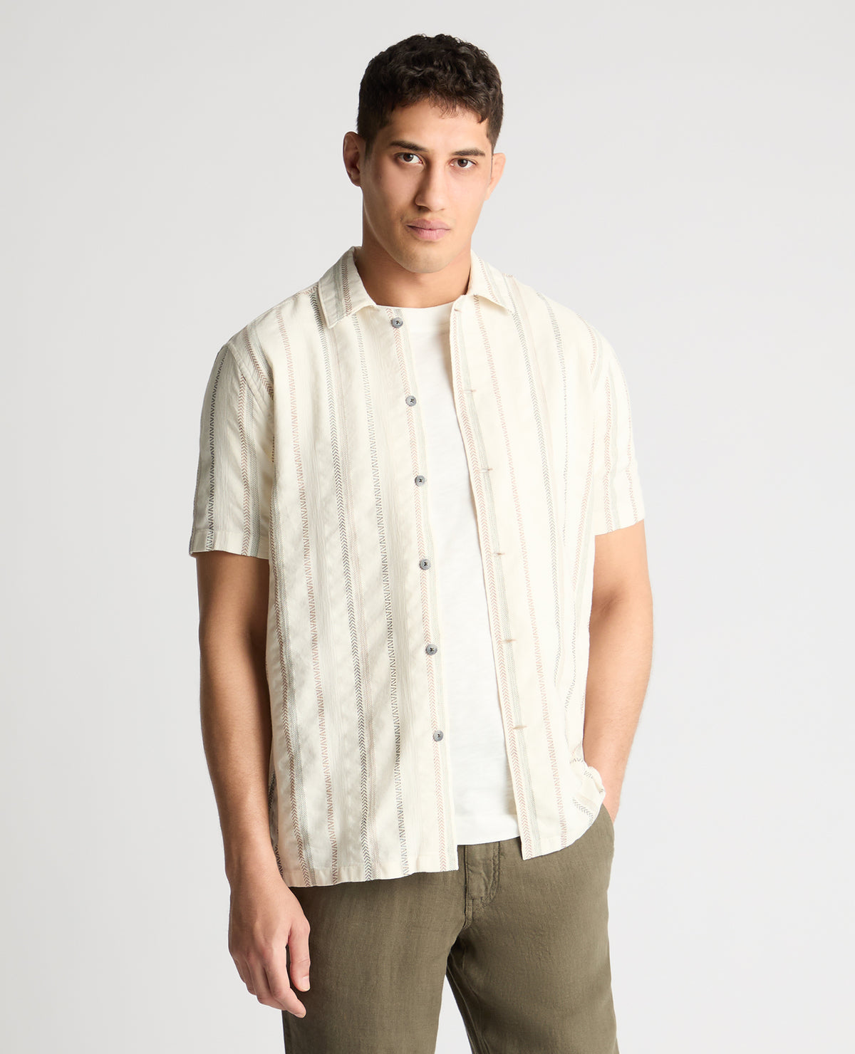 Man wearing a cream casual shirt