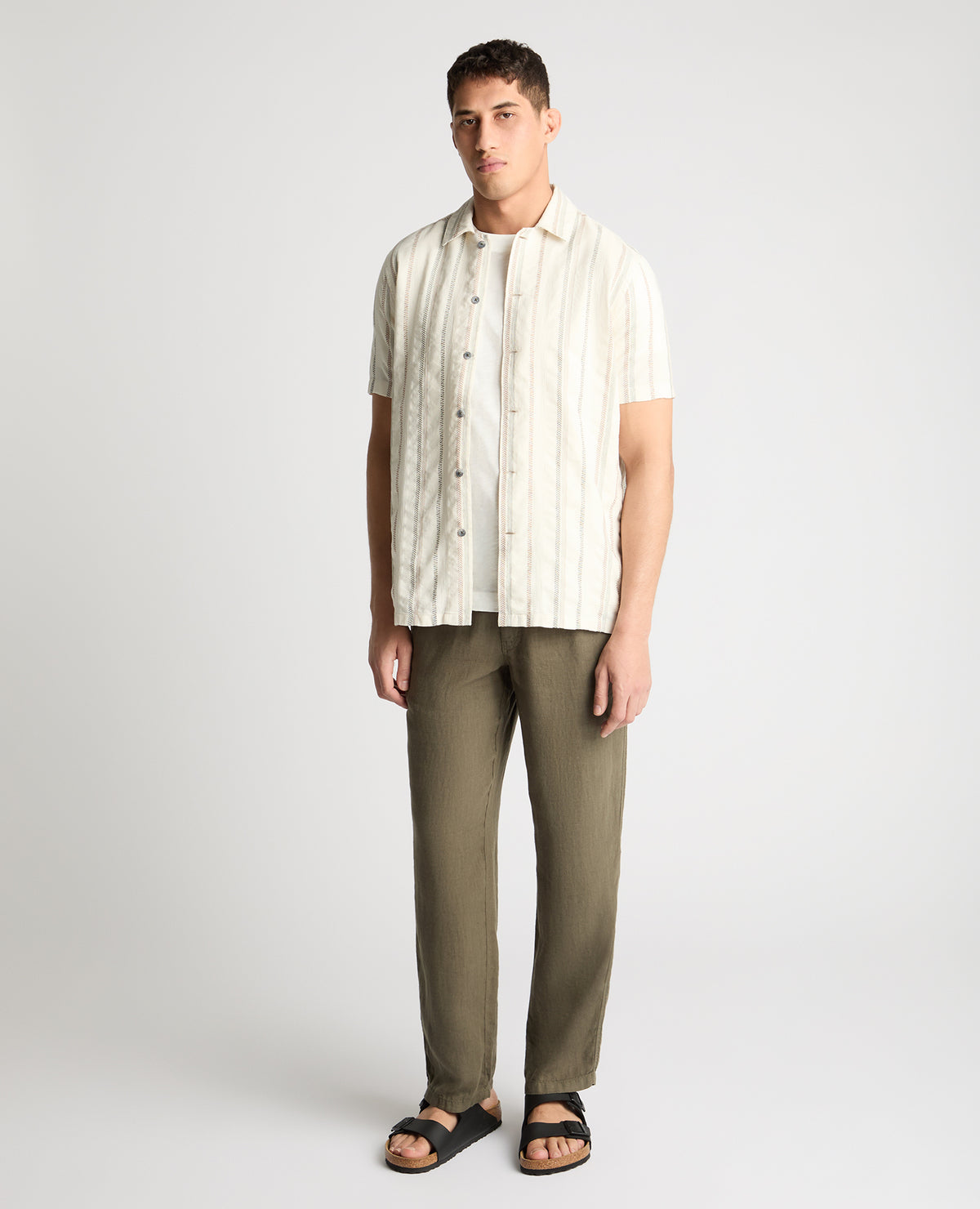 Man wearing a cream casual shirt