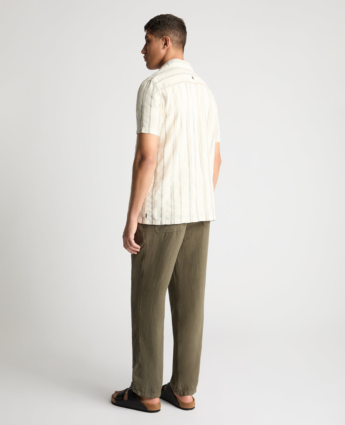 Man wearing a cream casual shirt