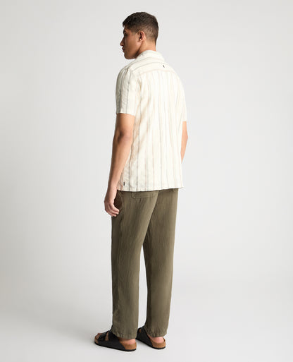 Man wearing a cream casual shirt