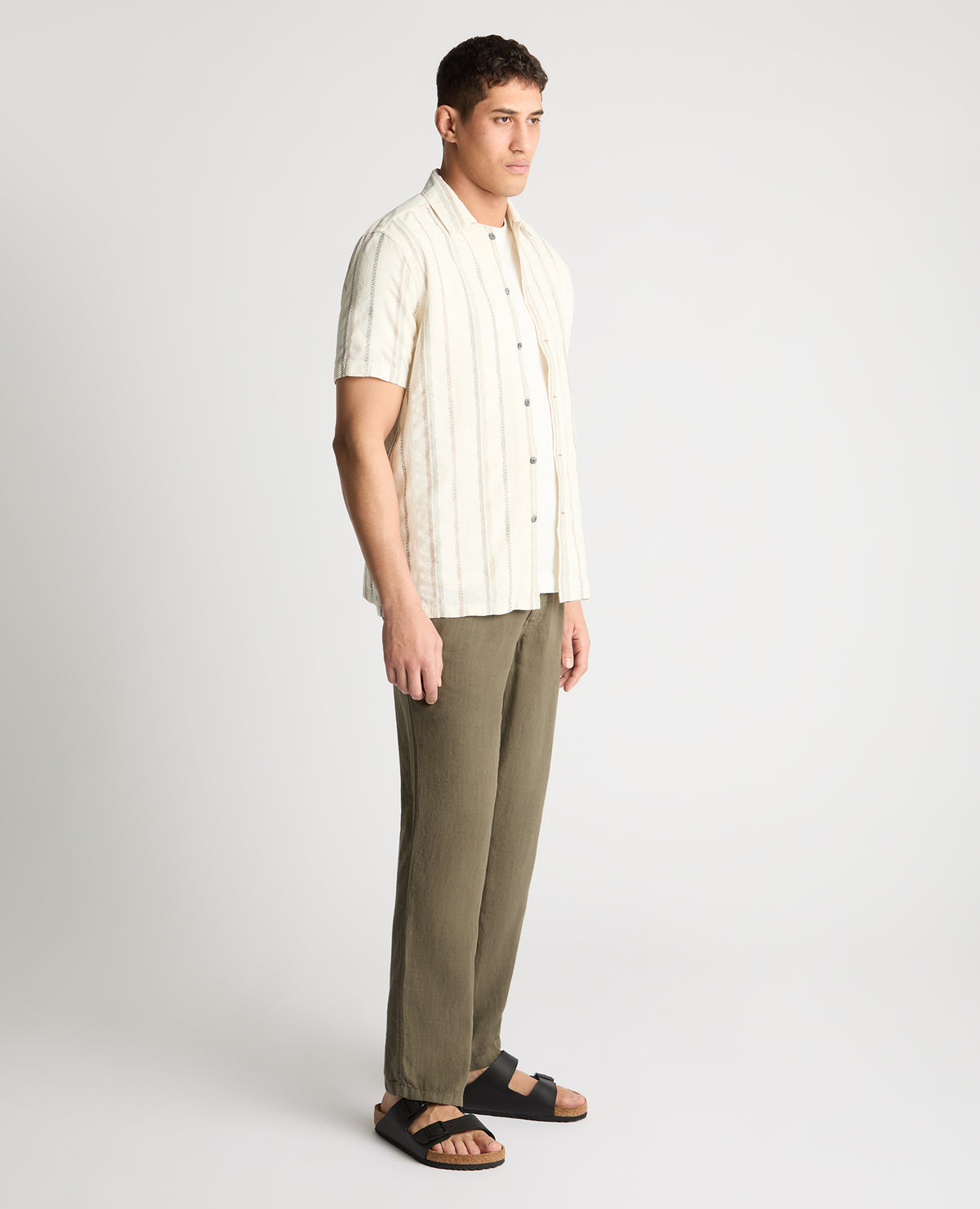 Man wearing a cream casual shirt