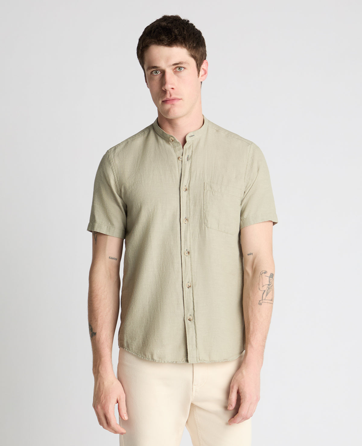 Man wearing a green casual shirt