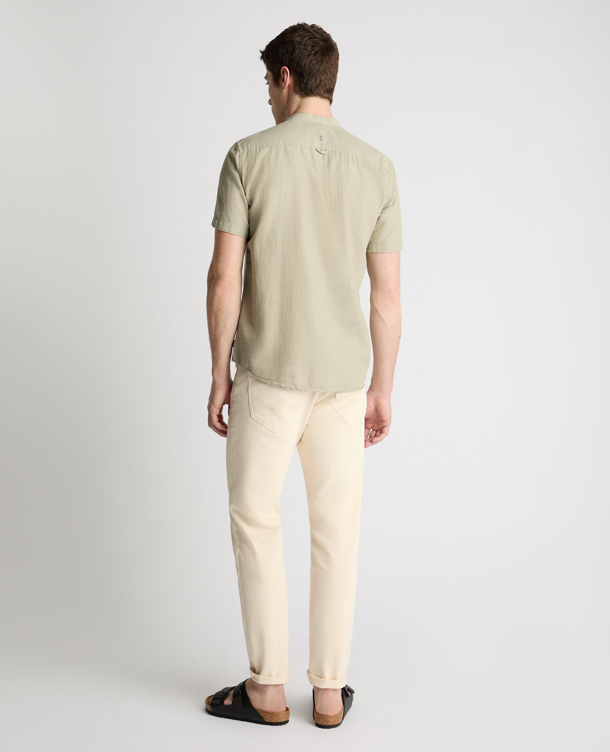 Man wearing a green casual shirt