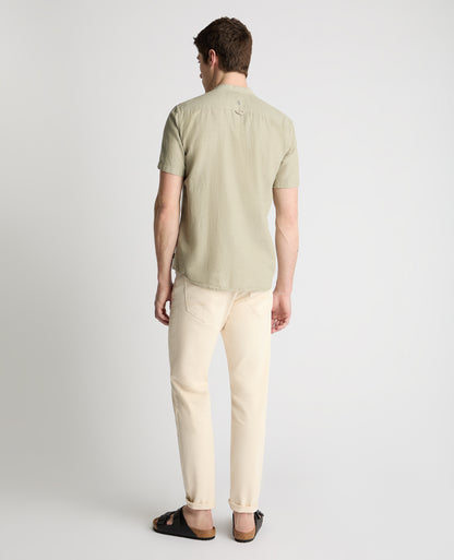 Man wearing a green casual shirt