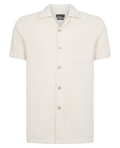 Man wearing a cream casual shirt