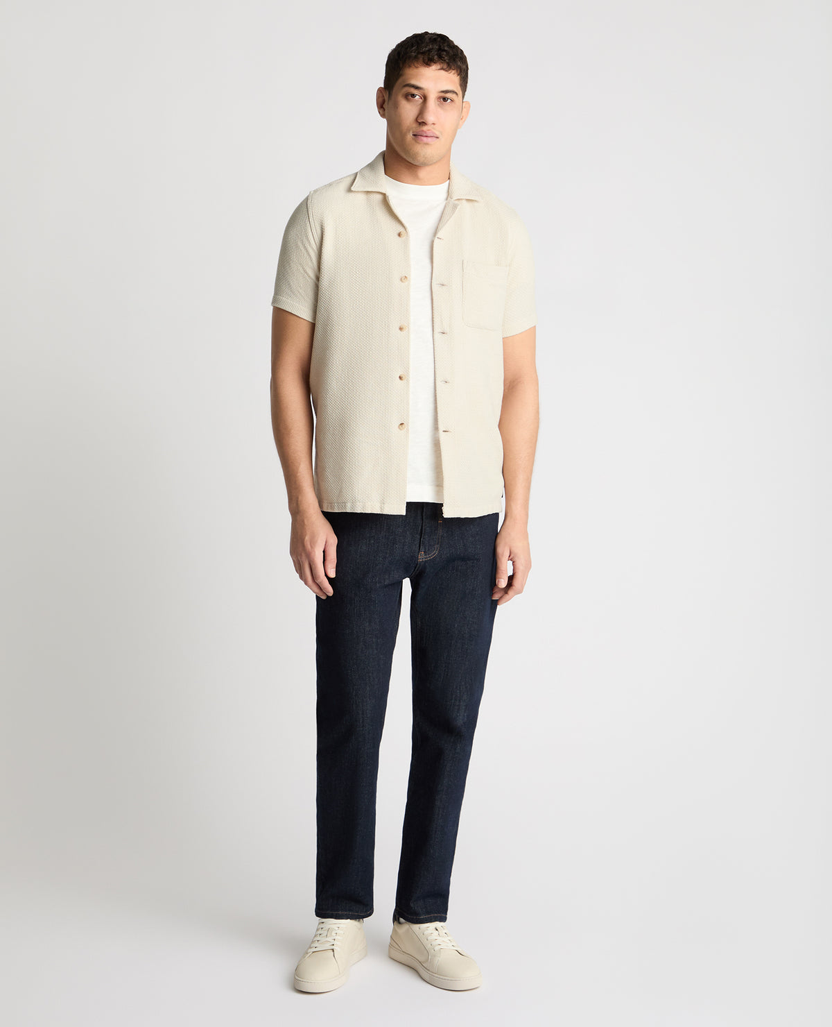 Man wearing a cream casual shirt