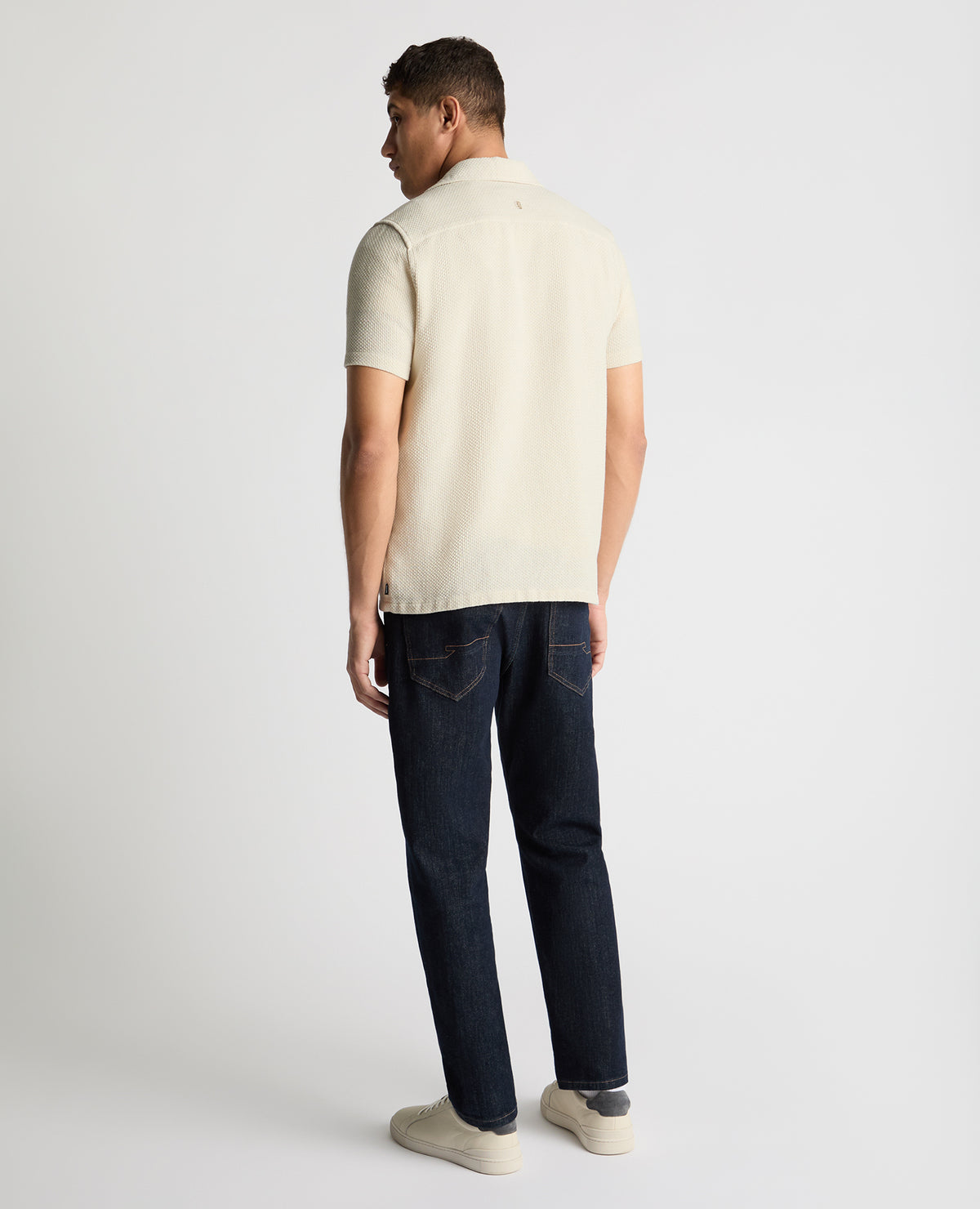 Man wearing a cream casual shirt