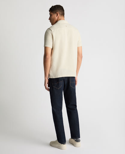 Man wearing a cream casual shirt