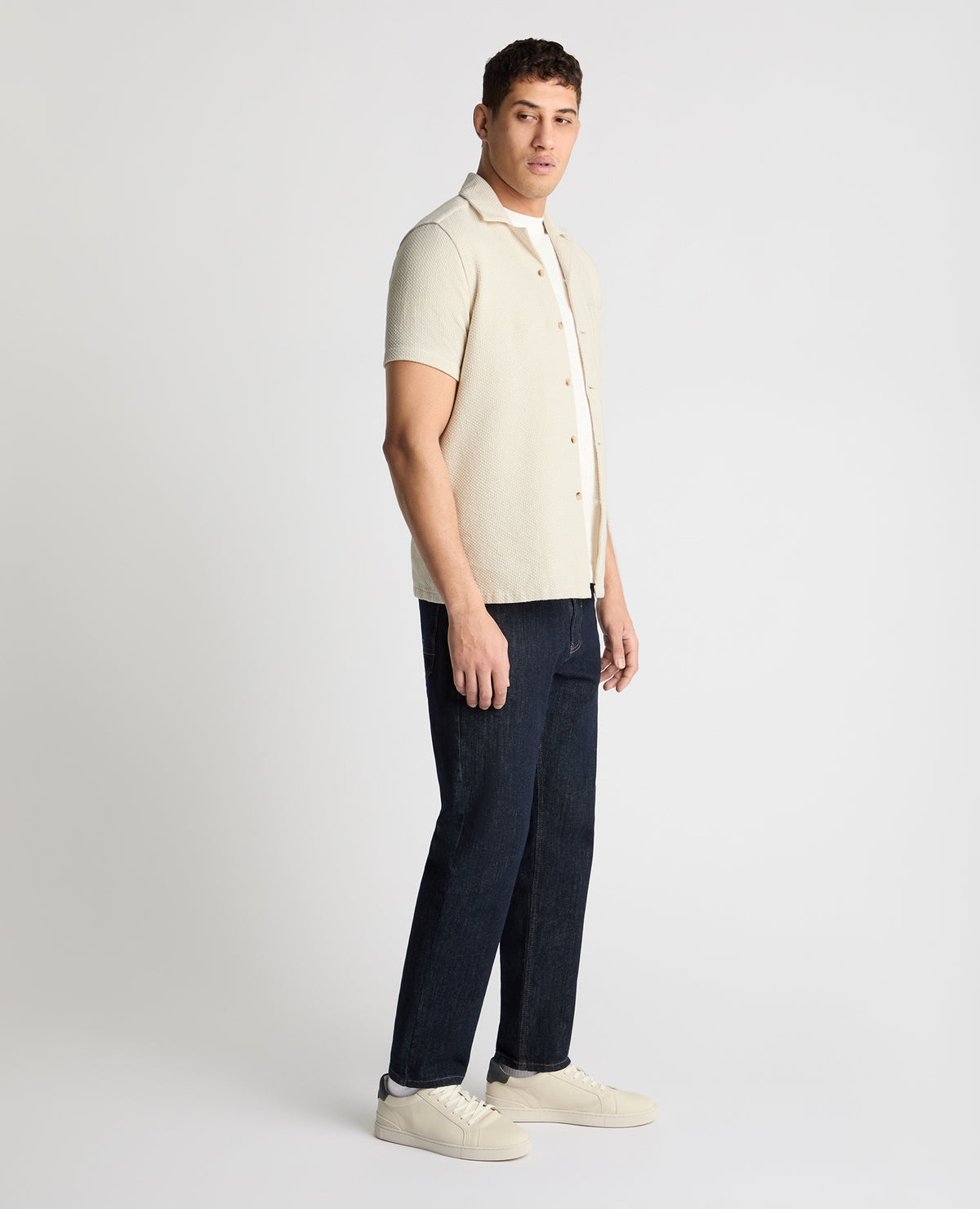 Man wearing a cream casual shirt