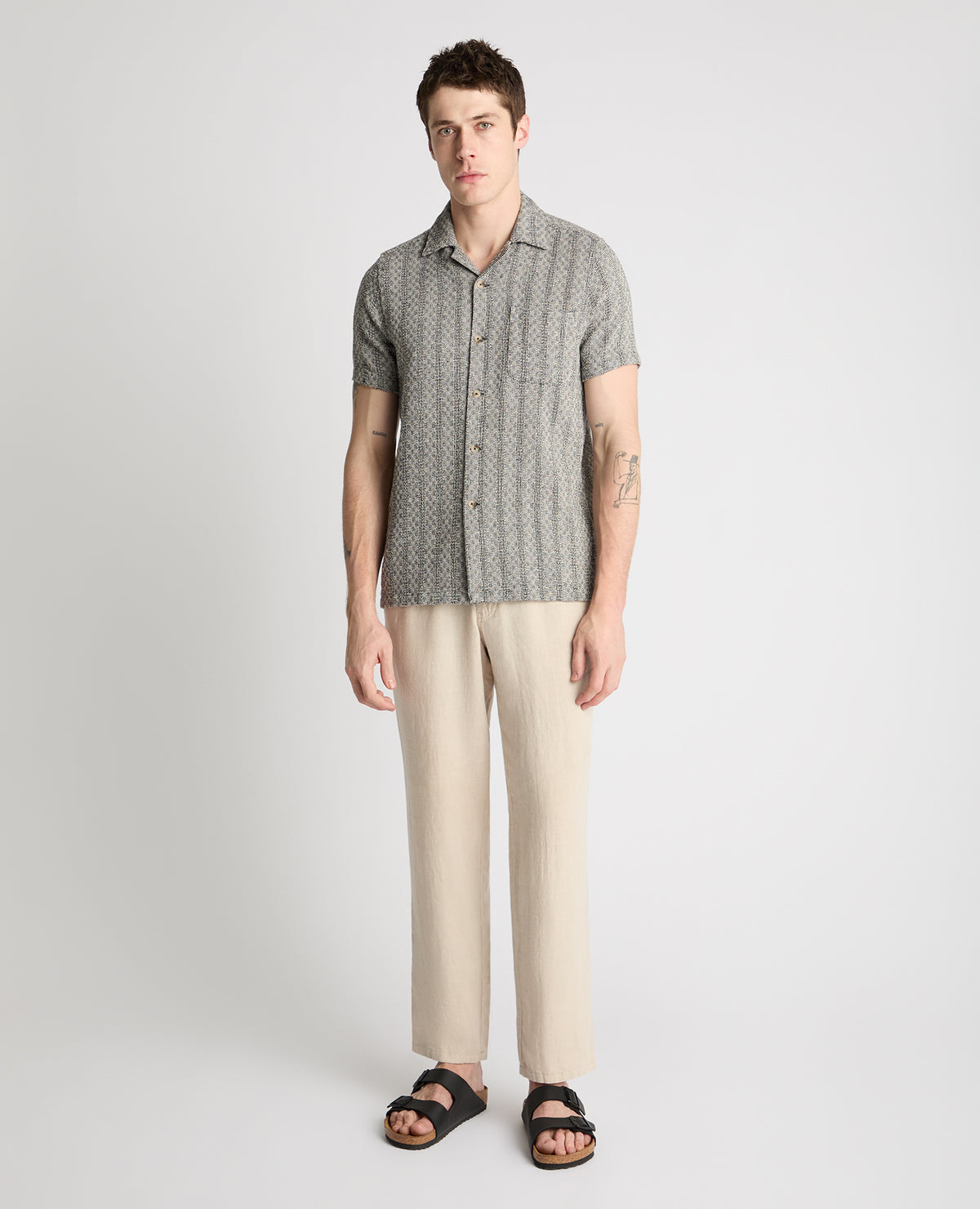 Man wearing a Grey casual shirt