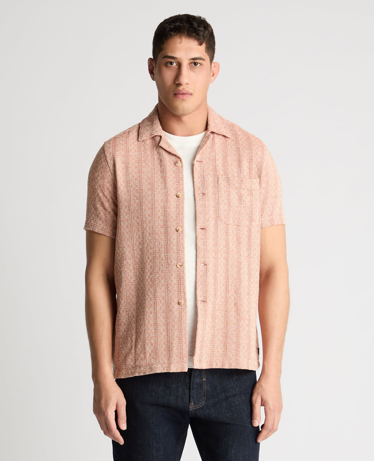 Man wearing a orange casual shirt
