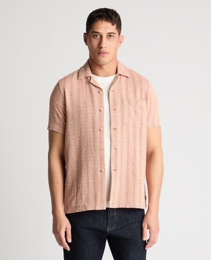 Man wearing a orange casual shirt