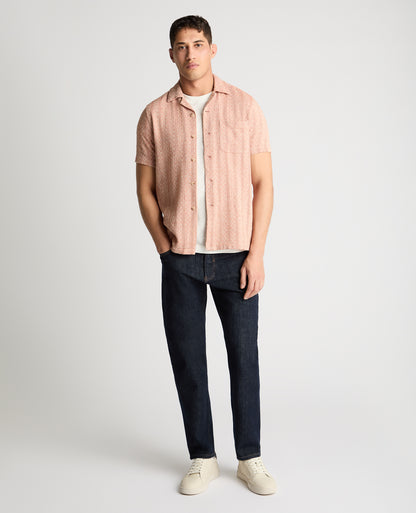 Man wearing a orange casual shirt