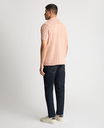 Man wearing a orange casual shirt