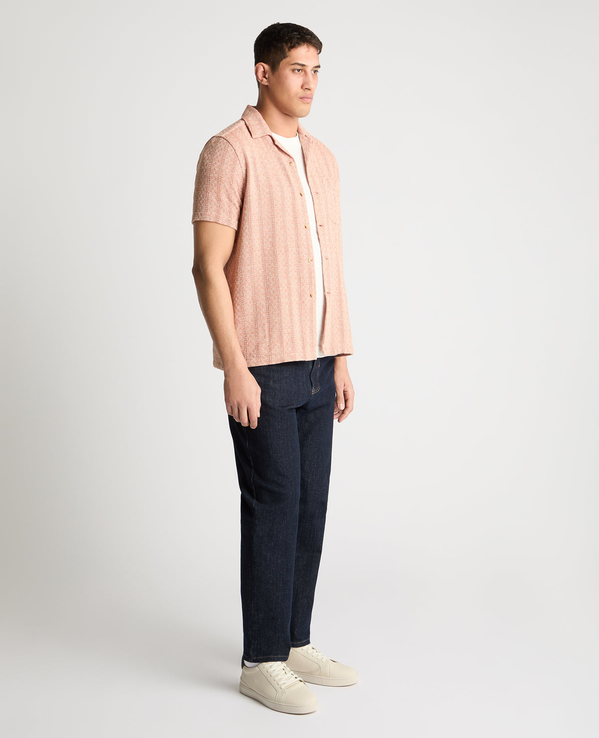 Man wearing a orange casual shirt