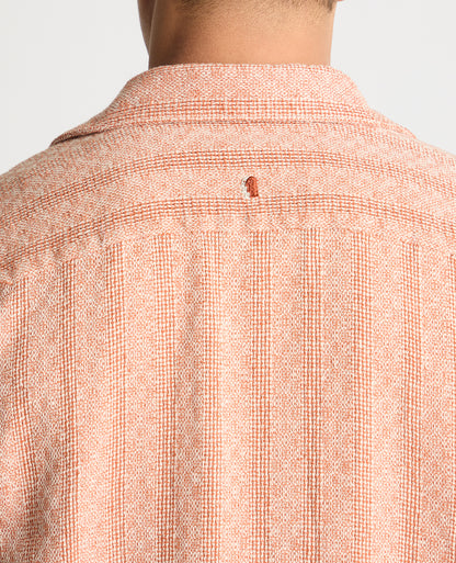 Man wearing a orange casual shirt
