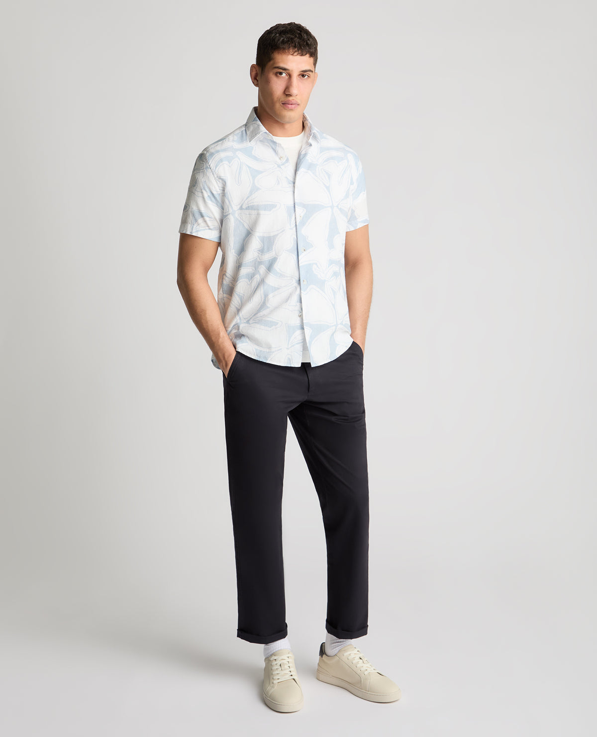 Man wearing a blue casual shirt