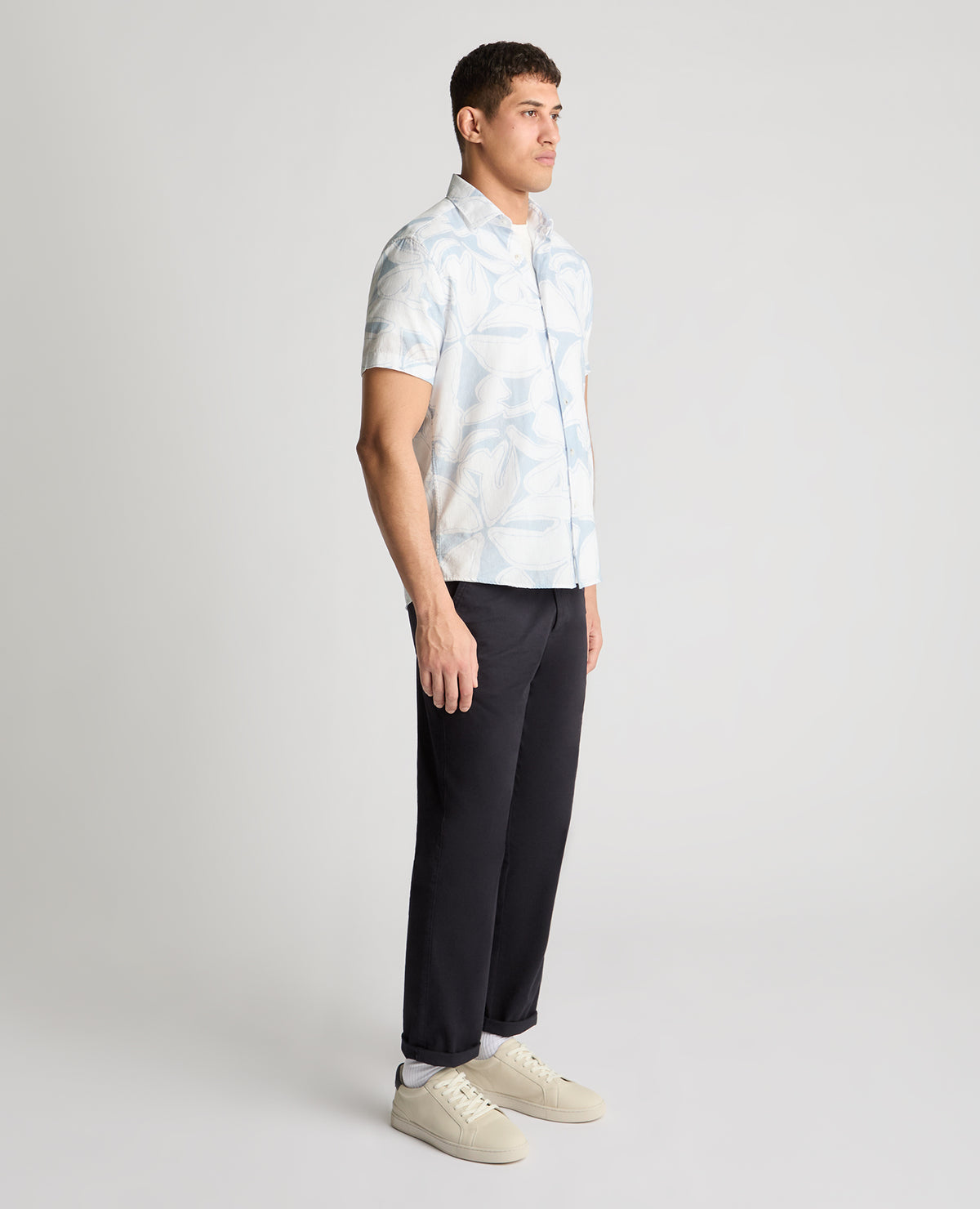 Man wearing a blue casual shirt