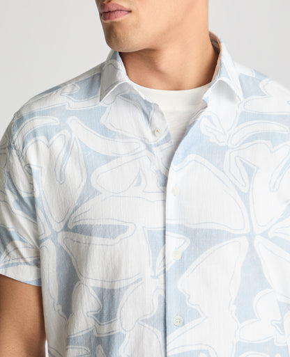 Man wearing a blue casual shirt
