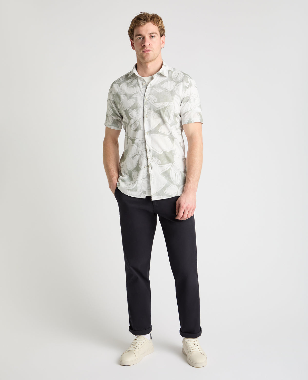 Man wearing a green casual shirt
