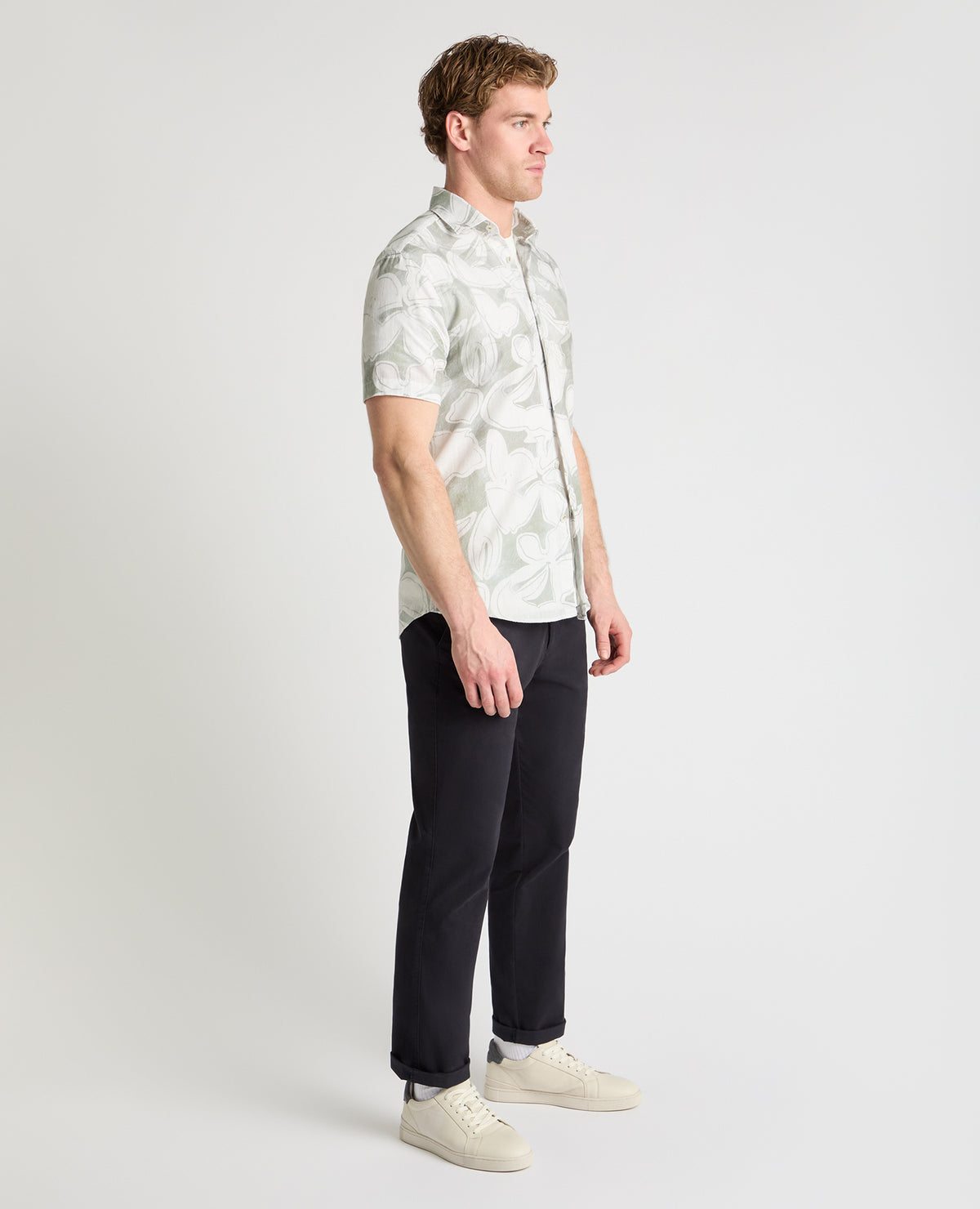 Man wearing a green casual shirt