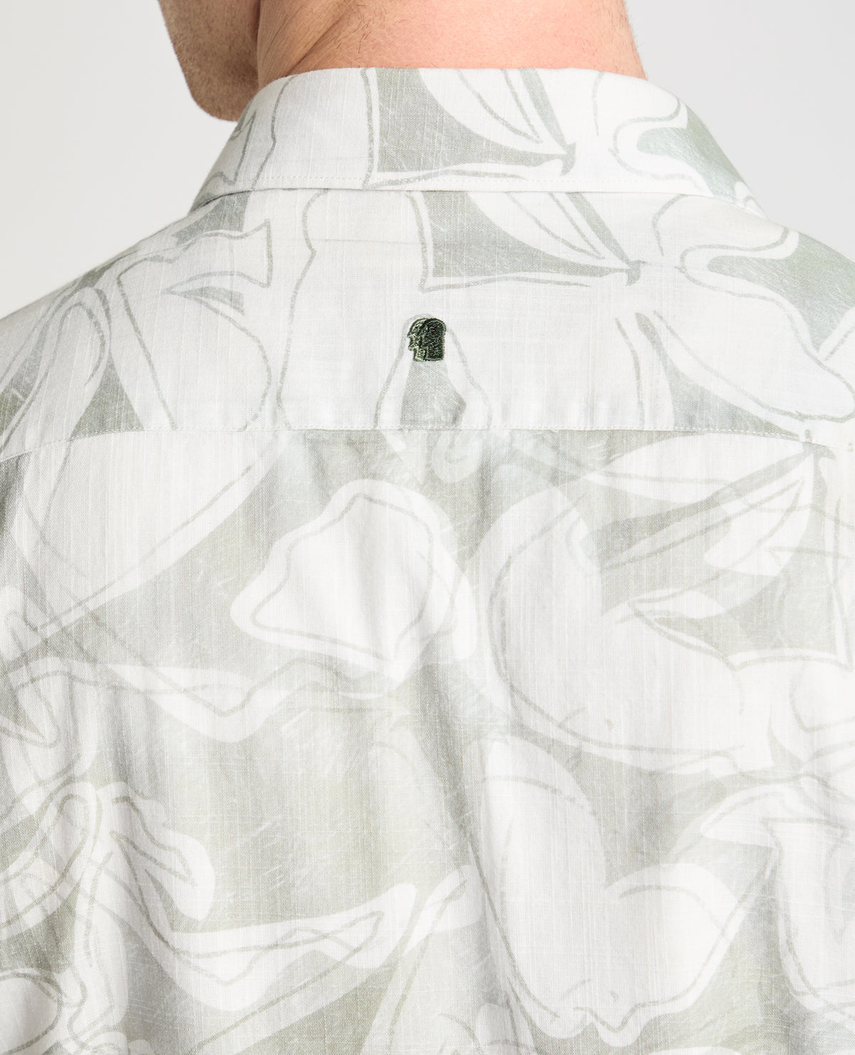 Man wearing a green casual shirt