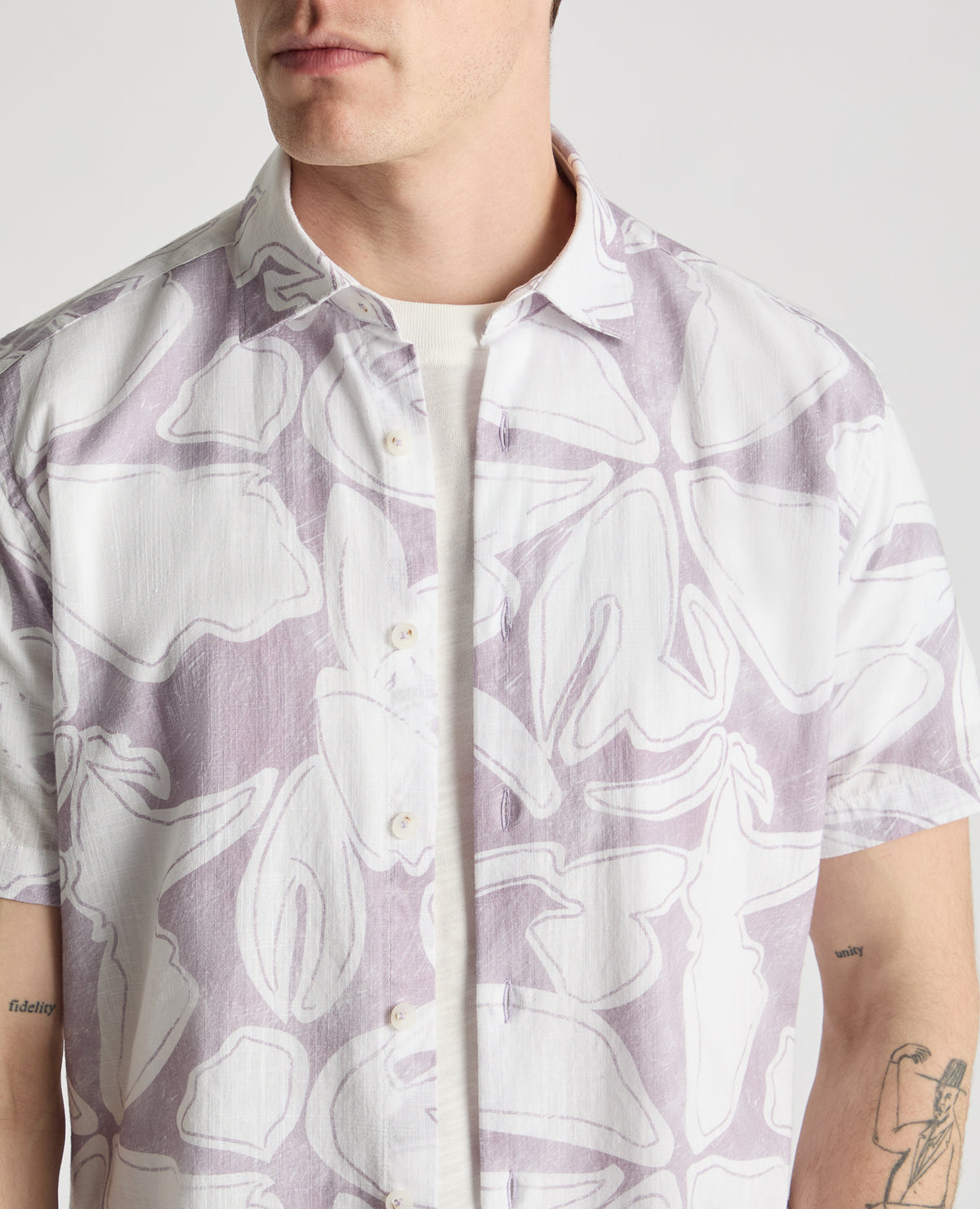 Man wearing a purple  casual shirt