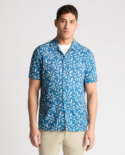 Man wearing a blue casual shirt