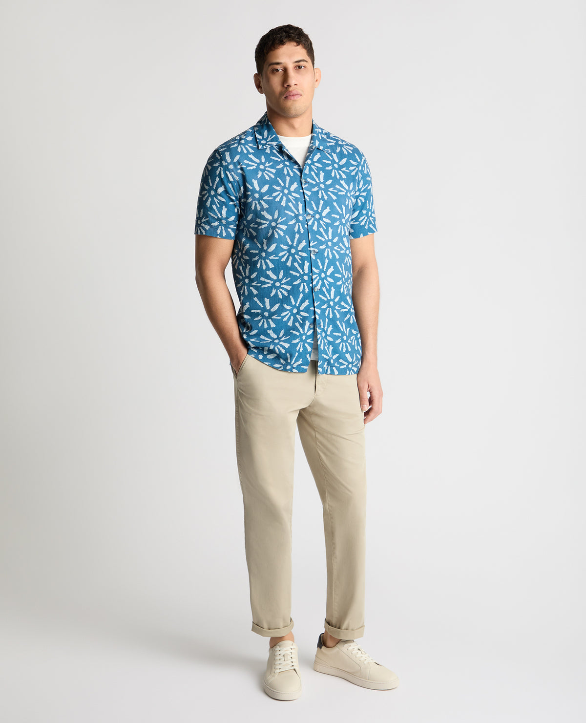 Man wearing a blue casual shirt