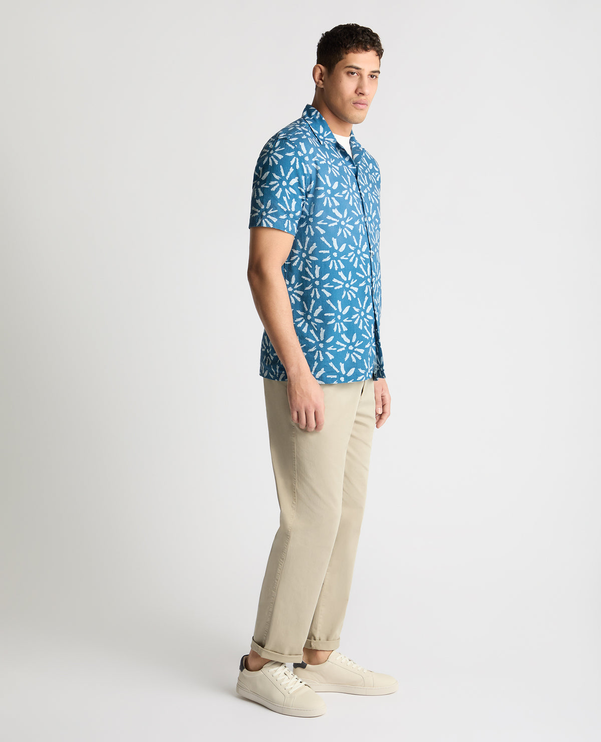 Man wearing a blue casual shirt