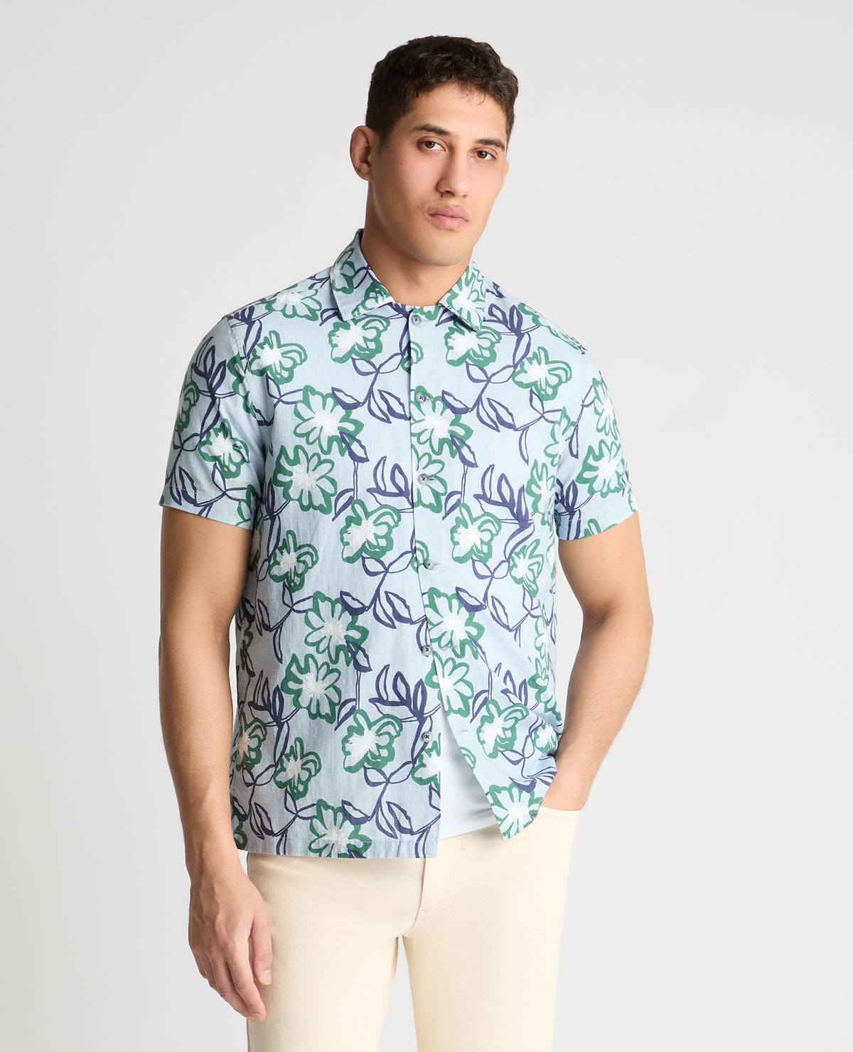 Man wearing a blue casual shirt