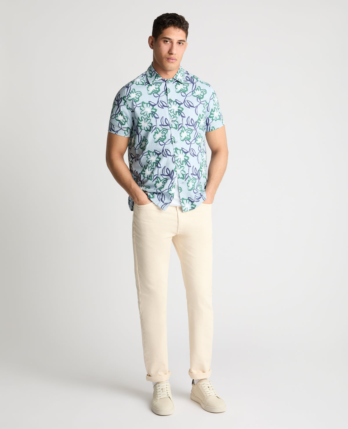 Man wearing a blue casual shirt