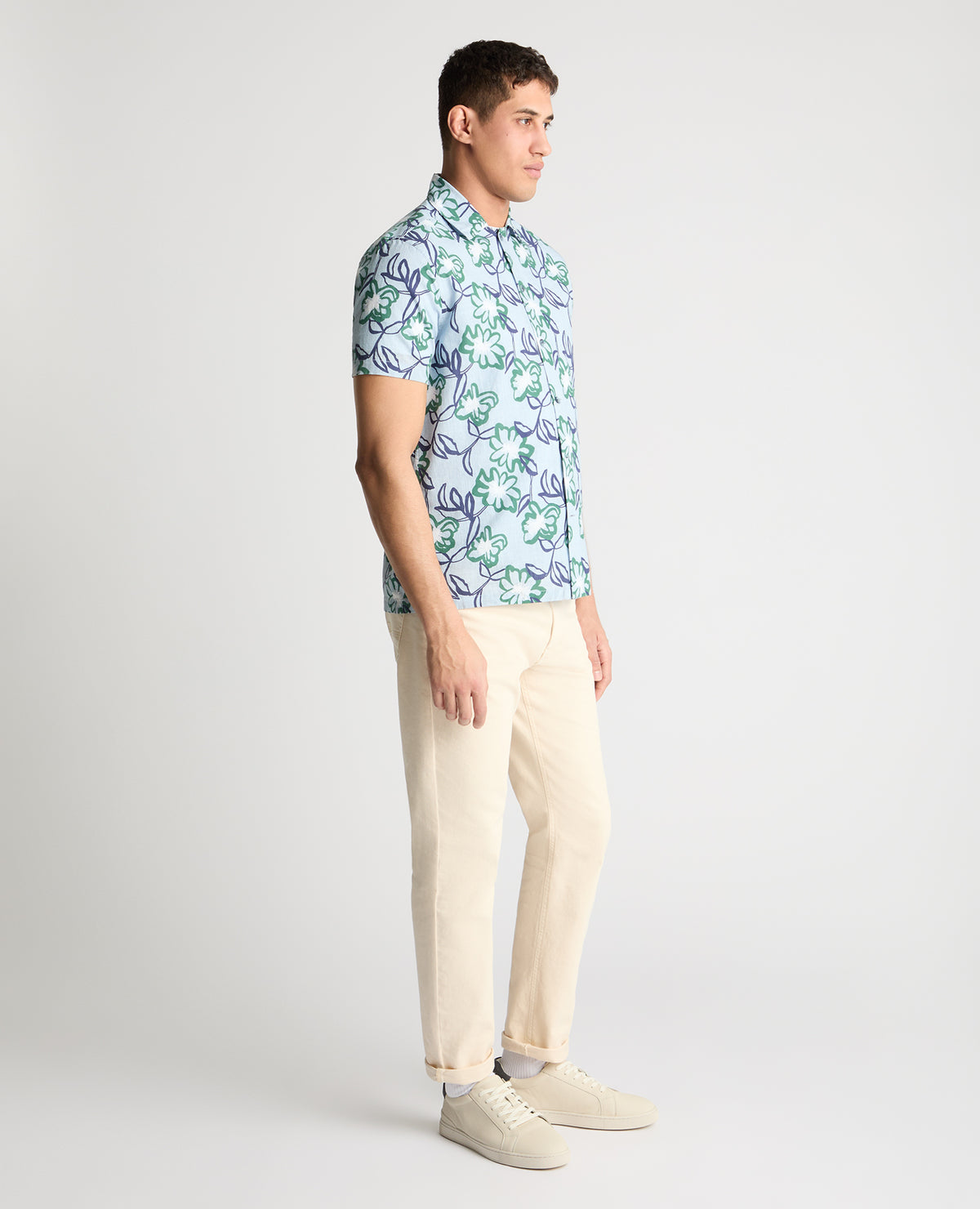 Man wearing a blue casual shirt
