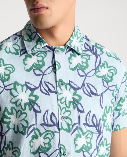 Man wearing a blue casual shirt