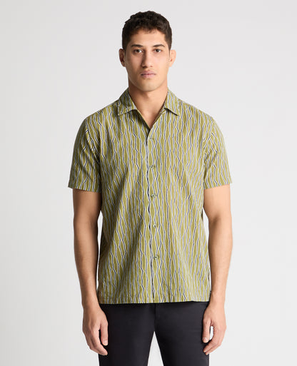 Man wearing a green casual shirt