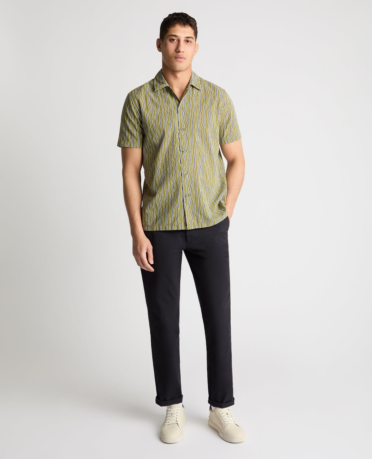 Man wearing a green casual shirt