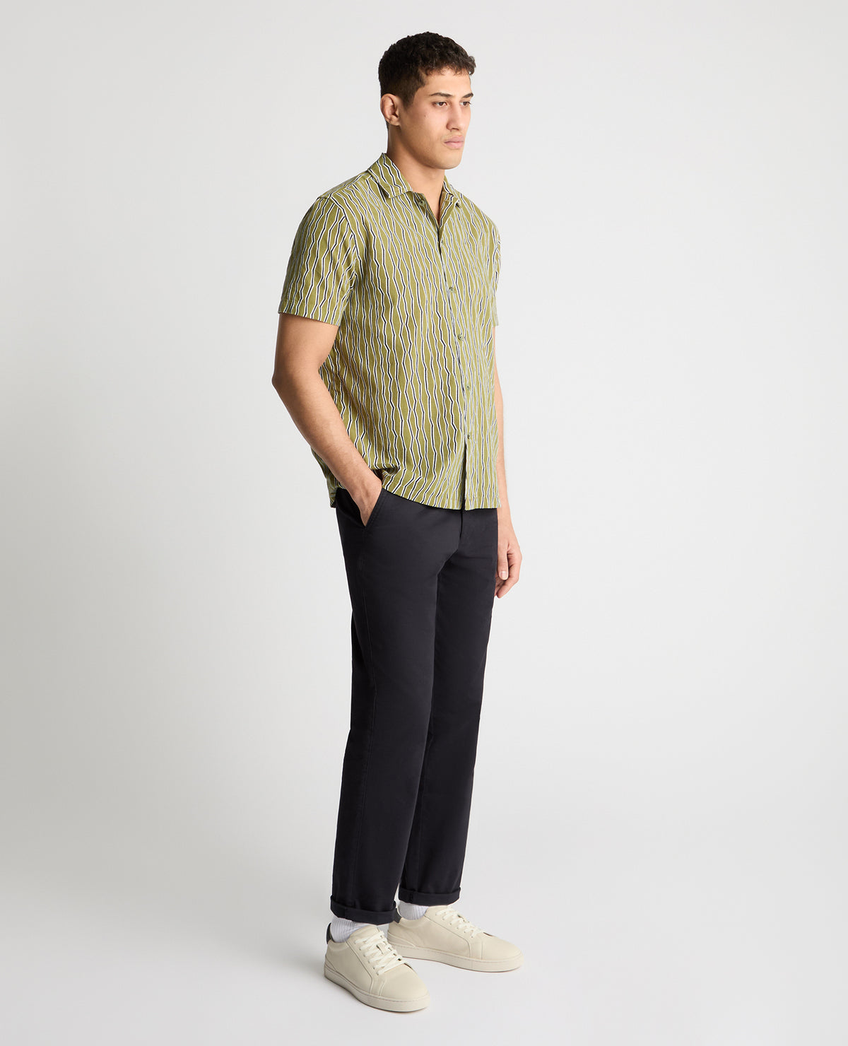 Man wearing a green casual shirt
