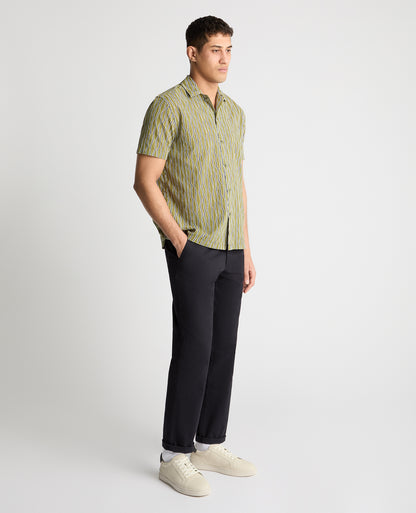 Man wearing a green casual shirt
